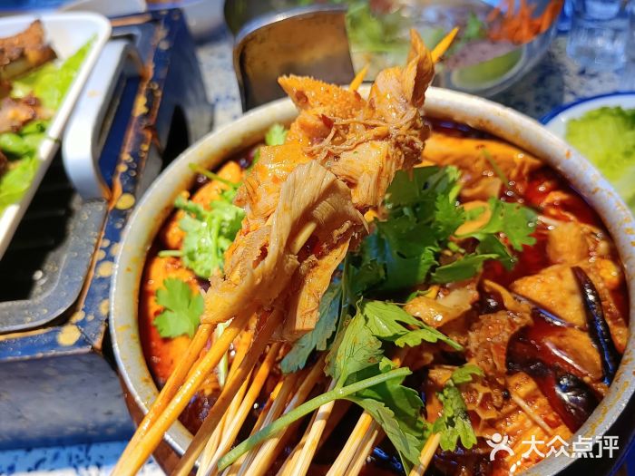 八爪章·东北烧烤·专业团建·企业年会(购物公园店)林氏毛肚锅图片