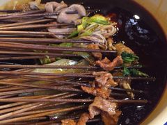 -拈签一笑黄牛肉辣卤串串