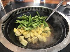 排骨炖油豆角-炮爷东北铁锅炖(棠安路店)