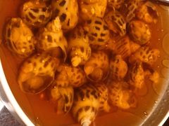 古越陈酿煮花螺-杭州西子湖四季酒店·金沙厅