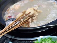 -明何记涮牛肚(品牌首店隋唐植物园南门古城路店)