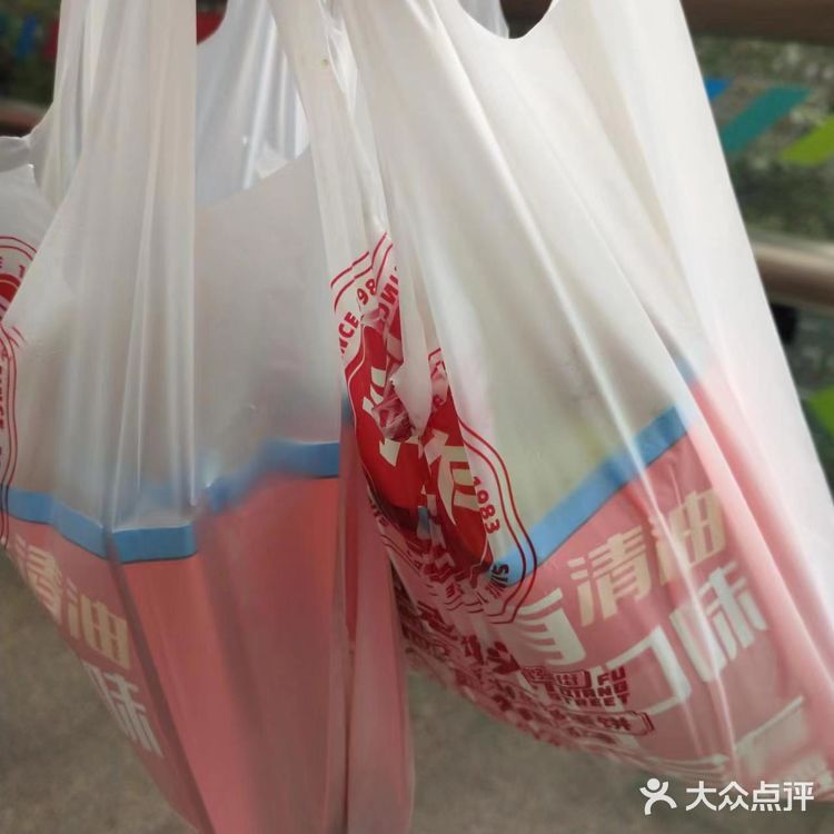 富强街的葱油饼啦啦也有啦