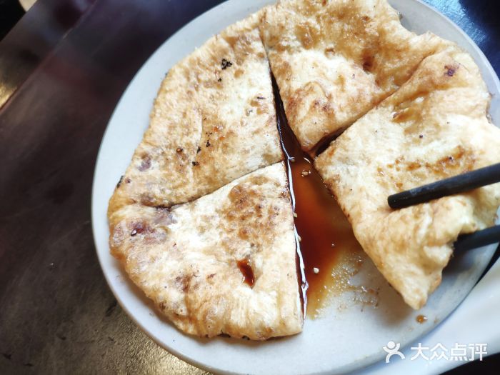 冯四孃跷脚牛肉·非物质文化遗产店红糖饼图片
