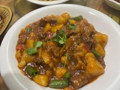 土豆烧牛腩-勇猛子川菜馆(新军路店)
