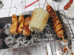 -喜悦小串丹东小黄牛海鲜烧烤大排档(民主广场店)
