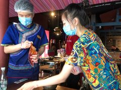 -老牌坊云南鱼豆花火锅(哈西万达店)