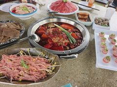 -茅草房·河畔园林火锅