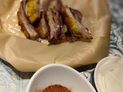 馕坑果木烤羊排-巴扎美食·新疆菜·西域歌舞表演餐厅(新疆大厦店)