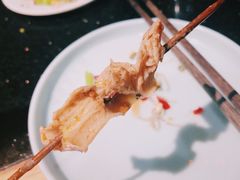 -明何记涮牛肚(品牌首店隋唐植物园南门古城路店)