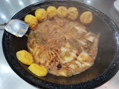 炖清江鱼-屯老二农家铁锅炖·行业领军者(梅江店)