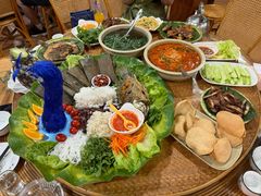 -沐毫傣泐云南菜孔雀宴•手抓饭傣味烧烤(曼听公园店)