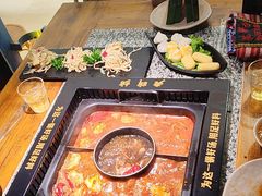 -老牌坊云南鱼豆花火锅(哈西万达店)