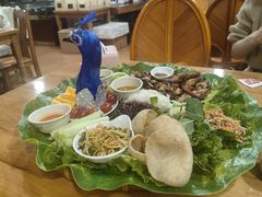 -沐毫傣泐云南菜孔雀宴•手抓饭傣味烧烤(曼听公园店)