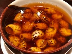 古越陈酿煮花螺-杭州西子湖四季酒店·金沙厅