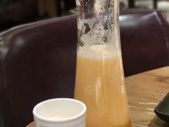 鲜榨芒果汁-耶里夏丽·新疆菜·家庭聚场(百联中环购物广场店)