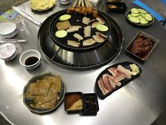 -彝人部落火盆烧烤(原内环足球场店)