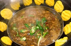 Signature Firewood-Steamed Goose