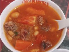 西红柿牛腩锅-添福来墨鱼饺子 · 海鲜东北菜(大连星海·黄浦路店)