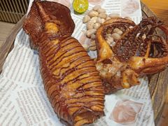 铁板香辣鱿鱼-草家酱蟹炭火烤肉店(珲春南路一店)