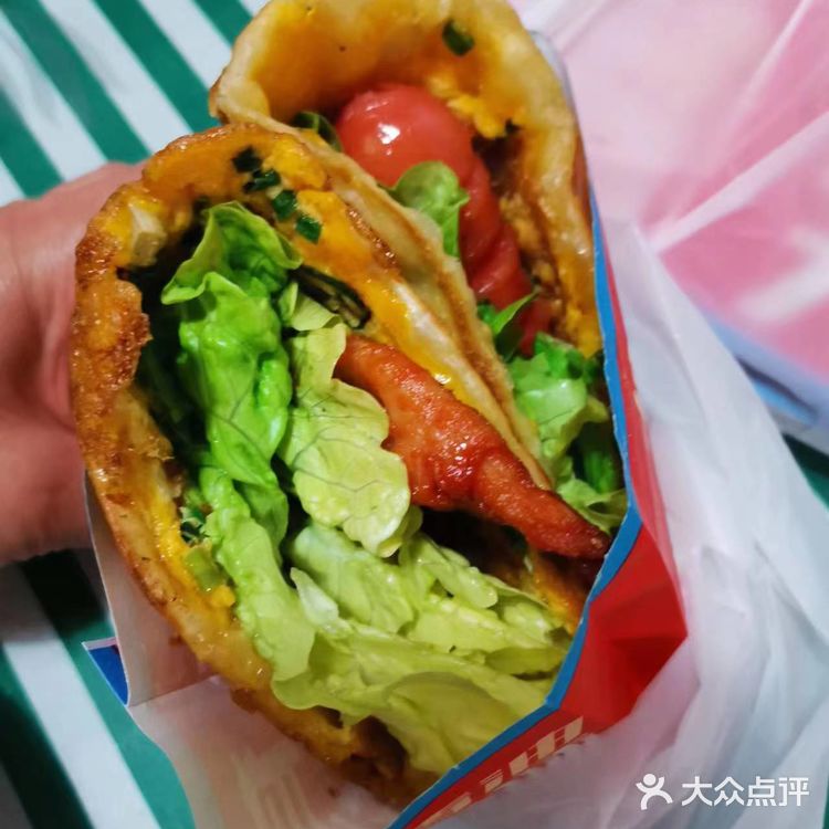富强街的葱油饼啦啦也有啦