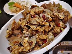 -明何记涮牛肚(品牌首店隋唐植物园南门古城路店)