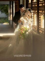 -雪中彩影婚纱摄影·微光艺术中心