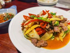 酸木瓜炒牛肉-紫滇源云南生态菜(丹凤街店)