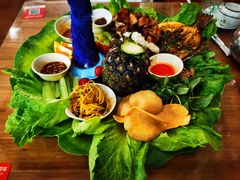 -沐毫傣泐云南菜孔雀宴•手抓饭傣味烧烤(曼听公园店)