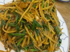 油渣炒土豆丝-小柒家第一锹东北菜(城关店)