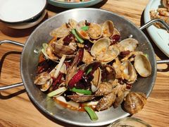 辣炒黄蚬子-金太阳海鲜烧烤·本地人餐厅(东纬路旗舰店)