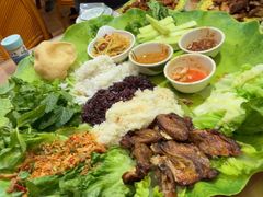 -沐毫傣泐云南菜孔雀宴•手抓饭傣味烧烤(曼听公园店)