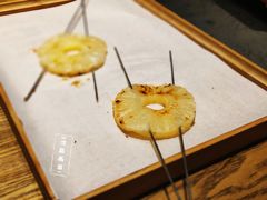 烤菠萝-潮庭·大连海鲜·炭火烧烤·扇贝王(大连店)