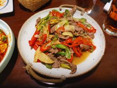 酸木瓜炒牛肉-紫滇源云南生态菜(丹凤街店)