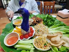 -沐毫傣泐云南菜孔雀宴•手抓饭傣味烧烤(曼听公园店)