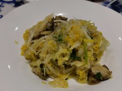 脆酸菜炝拌香螺-东方饺子王(大屯路店)