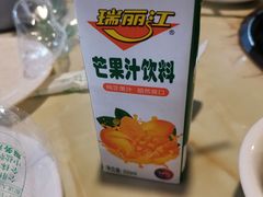 芒果汁-七采菌园·野生菌石锅鱼(环城北路店)