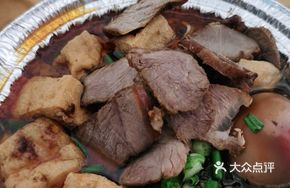 Braised Beef Noodles with Egg and Tofu Puffs