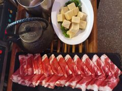 -老牌坊云南鱼豆花火锅(哈西万达店)