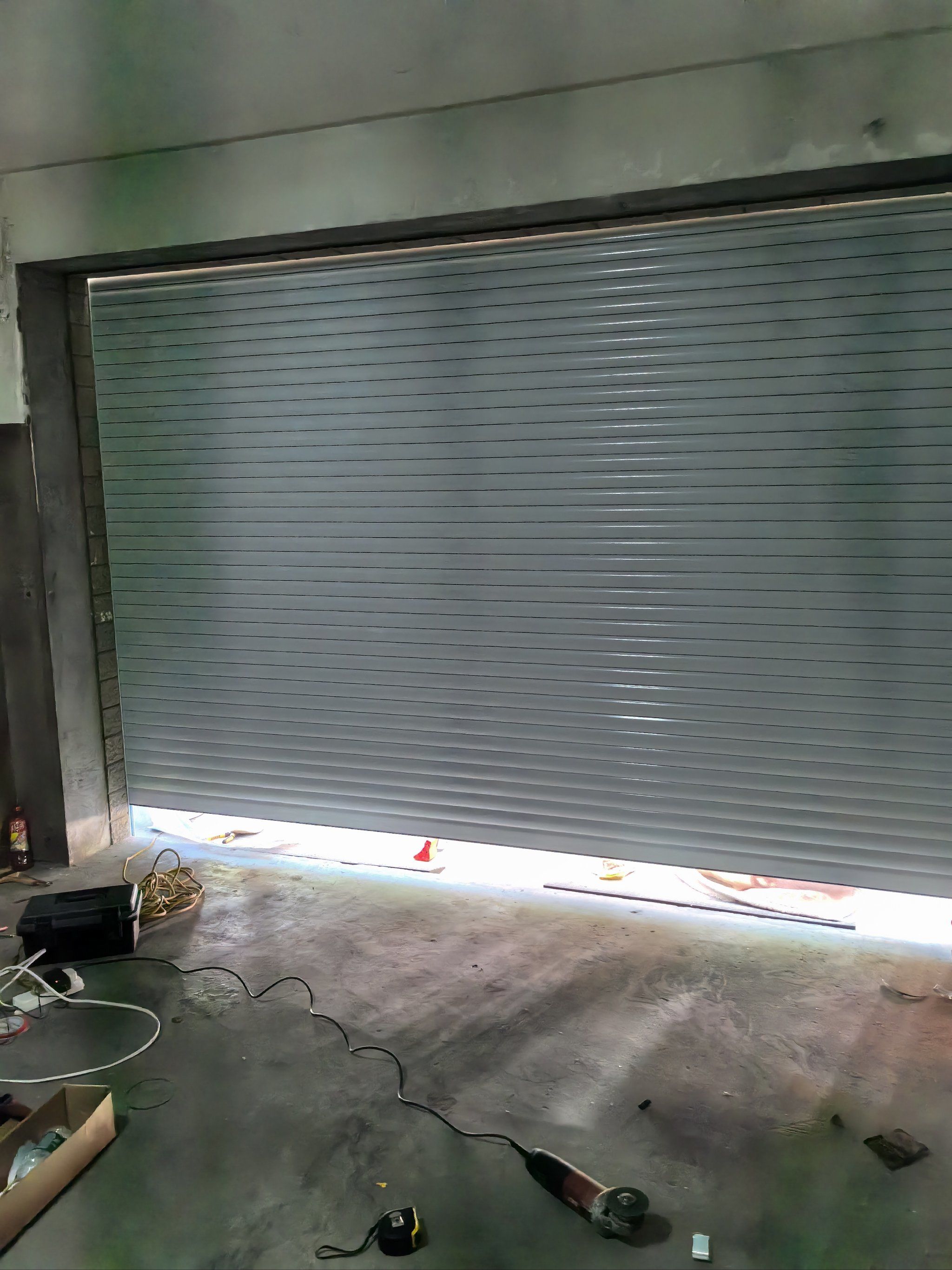 专业定做安装车库门,各类卷帘门