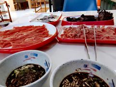 -毛辣果·贵州红酸汤牛肉火锅(西单店)