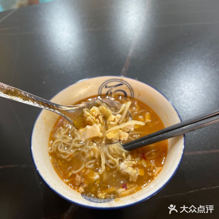 这家苏曹记据说很正宗,是老字号,在白沙传了好几代