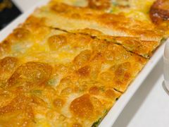 鸡蛋葱花飞饼-大铁勺新津菜(东丽阳光新业广场店)