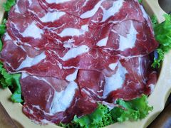 -老牌坊云南鱼豆花火锅(哈西万达店)