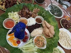 -沐毫傣泐云南菜孔雀宴•手抓饭傣味烧烤(曼听公园店)