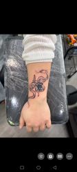-龙之吻专业刺青·手工耳洞·纹身去色
