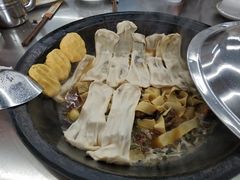 粘卷子-屯老二农家铁锅炖·行业领军者(梅江店)