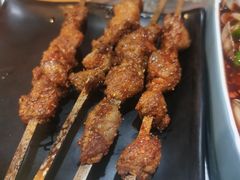 -明何记涮牛肚(品牌首店隋唐植物园南门古城路店)