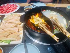 -明何记涮牛肚(品牌首店隋唐植物园南门古城路店)