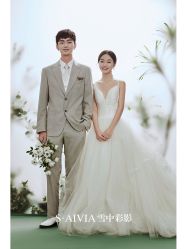 -雪中彩影婚纱摄影·微光艺术中心