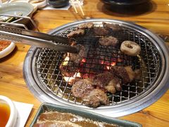 极品浇汁肥牛肋条-草家酱蟹炭火烤肉店(珲春南路一店)